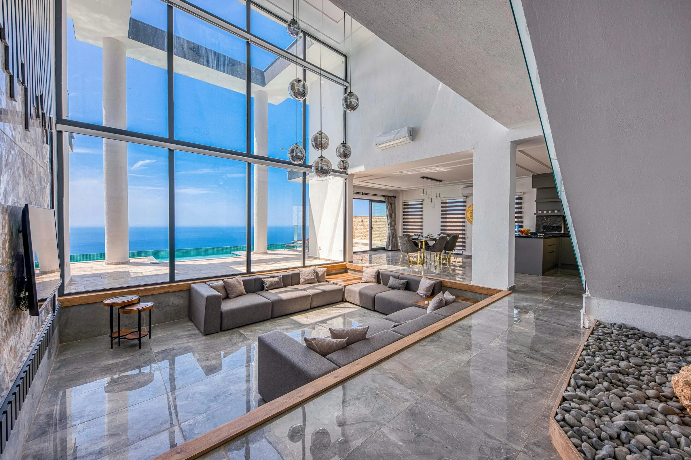 Living premium de un alojamiento boutique con vista al mar